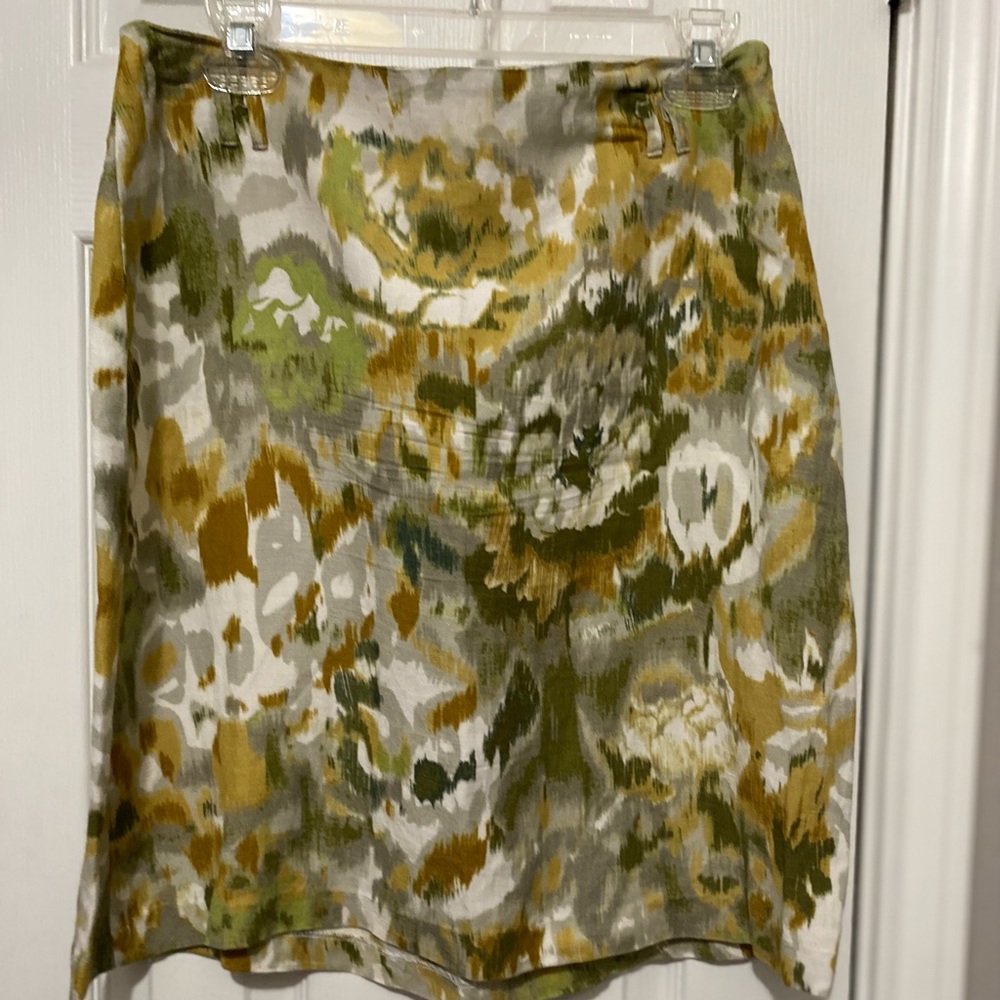 Straight green skirt above knee